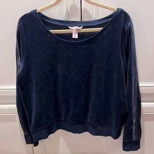 Navy blue velour sweatshirt with navy blue satin racing stripe down the arm.